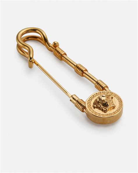 Versace: Gold Safety Pin Brooch 